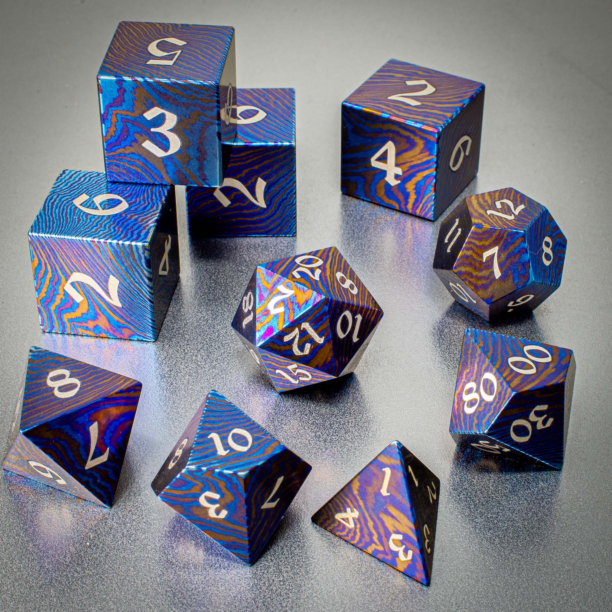Timascus Dice (Titanium Damascus) | Artisan Dice